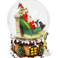 20cm Musical Snow Globe With Santa In Armchair (We Wish You A Merry Christmas) image