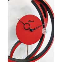 55cm Contemporary Swirl Red Wall Clock With Pendulum By HERMLE image