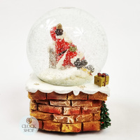 14.5cm Musical Snow Globe With Santa On Chimney (We Wish You a Merry Christmas) image