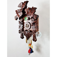 5 Leaf & Bird Battery Carved Kuckulino With Swinging Doll 16cm By TRENKLE image