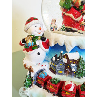 19cm Musical Snow Globe With LED & Train (8 Christmas Tunes) image
