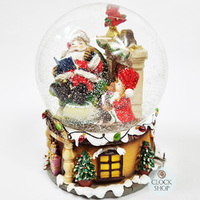 20cm Musical Snow Globe With Santa In Armchair (We Wish You A Merry Christmas) image