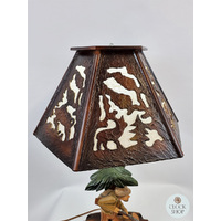 Hand Carved Lamp With Hunter By Thomas Eyring image