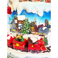 19cm Musical Snow Globe With LED & Train (8 Christmas Tunes) image