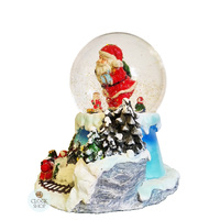 19cm Musical Snow Globe With LED & Train (8 Christmas Tunes) image