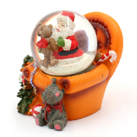 5cm Santa In Armchair Snow Globe- Assorted Designs image