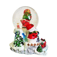 19cm Musical Snow Globe With LED & Train (8 Christmas Tunes) image
