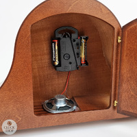 21.5cm Walnut Battery Tambour Mantel Clock With Westminster Or Bim Bam Chime By HERMLE image