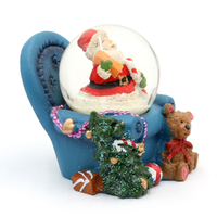 5cm Santa In Armchair Snow Globe- Assorted Designs image