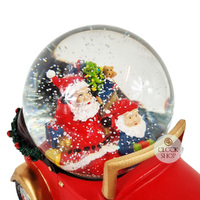 16cm Musical Snow Globe With Santa On Vintage Car (Paint Blemish) image
