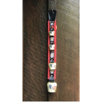 4 Bells On Red Felt Strap With Alpine Flower