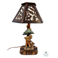 Hand Carved Lamp With Hunter By Thomas Eyring image