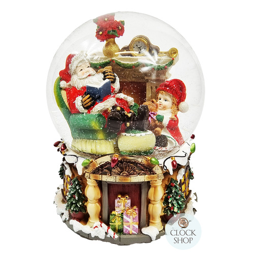20cm Musical Snow Globe With Santa In Armchair - We Wish You A Merry Christmas (Discoloured Liquid) image