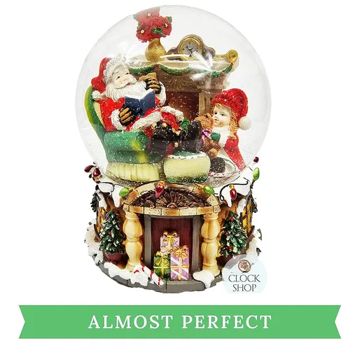 20cm Musical Snow Globe With Santa In Armchair - We Wish You A Merry Christmas (Discoloured Liquid) image